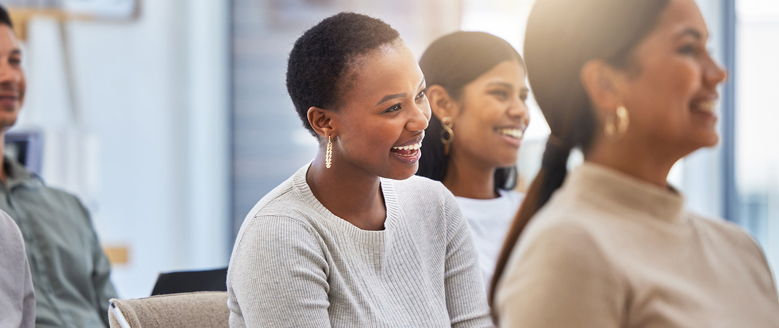 A group of women in a meeting.