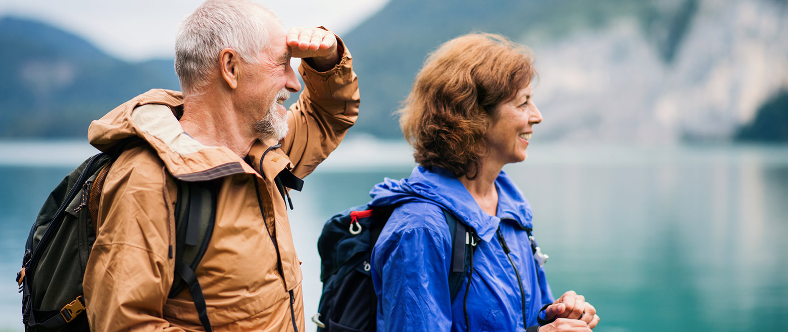Hiking couple looking into the distance