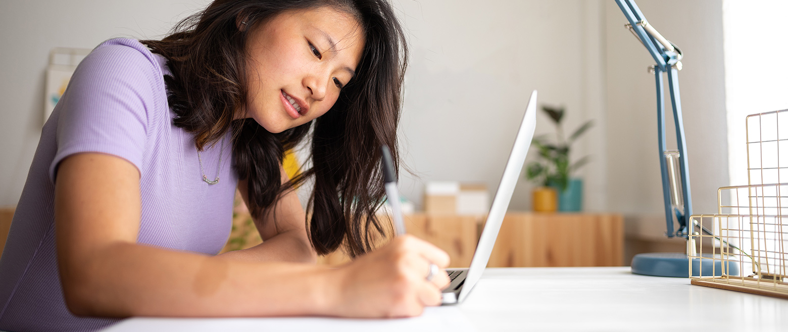 Woman writing something down