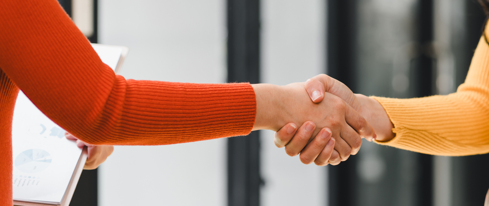 People shaking hands.