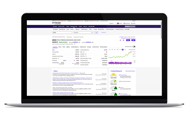 E*TRADE website displayed on a laptop