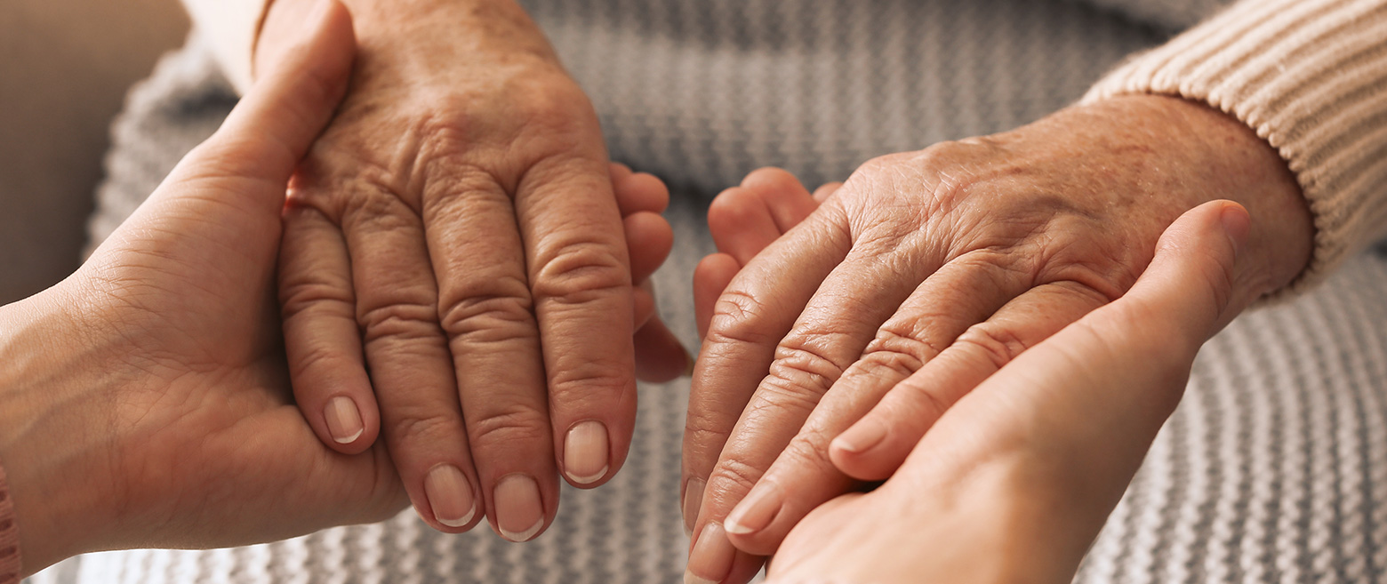 Hands holding each other