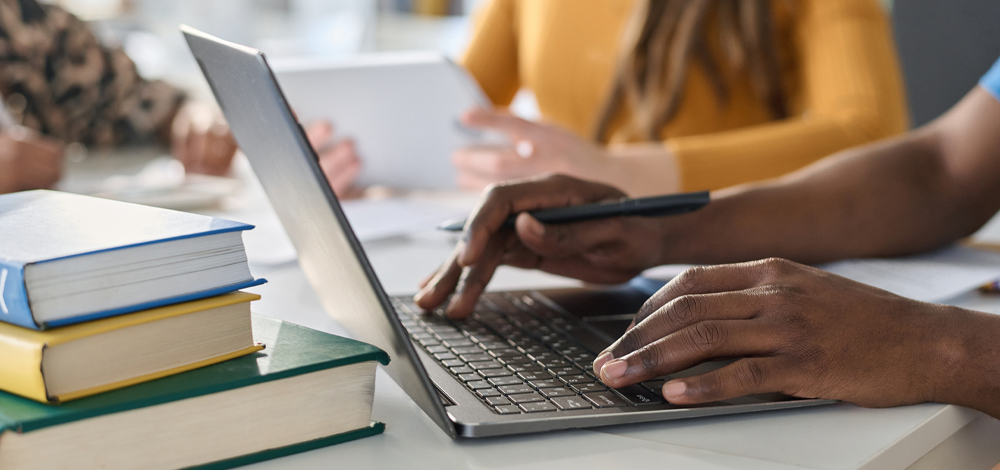 Man typing on laptop